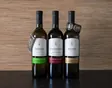 A row of wine bottles showing their labels