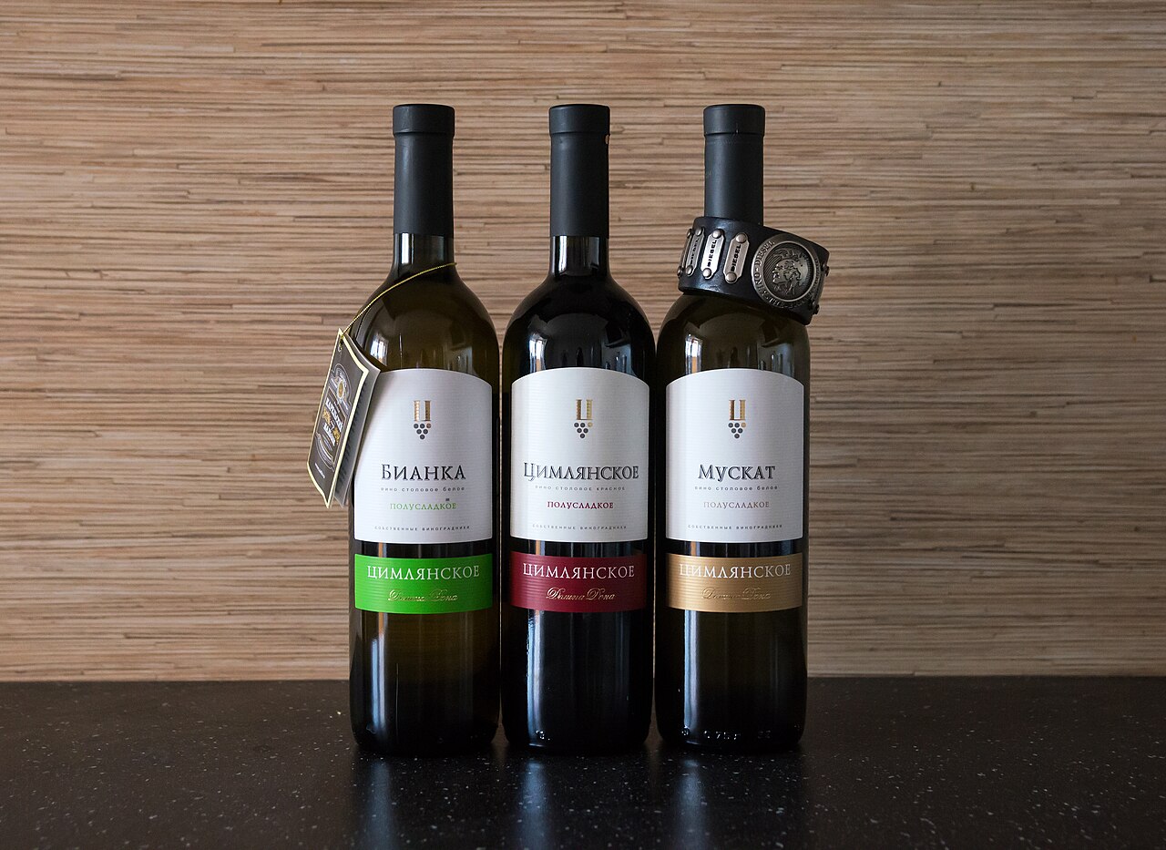 A row of wine bottles showing their labels